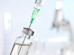 Expert says Pfizer vaccine requires time to work as vaccinated nurse contracts COVID