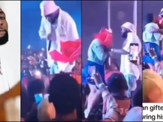 Heartwarming moment Davido accepts bouquet from female fan during his performance