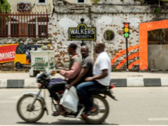 Nigeria devalues the naira in bid to attract foreign investors